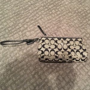 Coach signature oversized wristlet